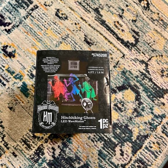 Color changing Haunted Mansion hitchhiking ghost LED WaveMotion projector - Picture 6 of 6